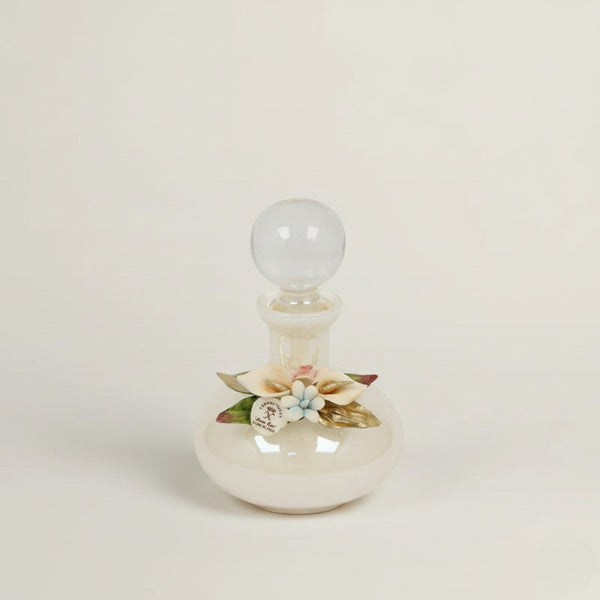 Handcrafted Bianco Murano glass perfume bottle with elegant floral detailing by Fleur De Lis