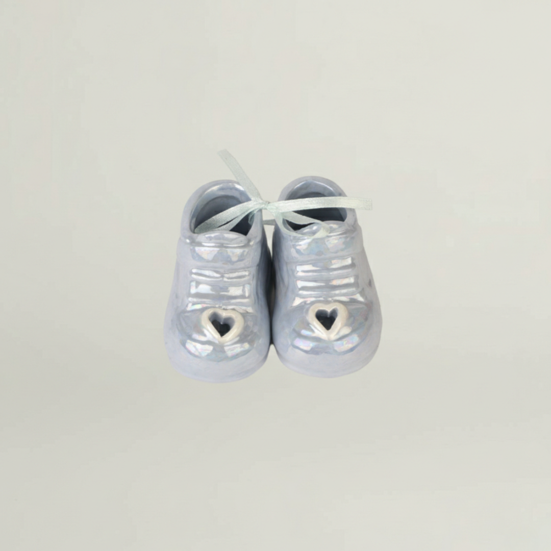 Ceramic baby shoes keepsake in pastel blue – elegant decorative element for newborn luxury gift hamper.