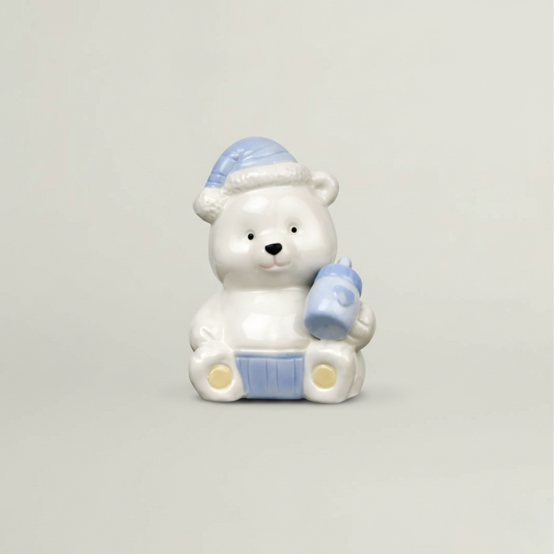 Soft blue ceramic teddy bear decorative keepsake for baby gift hamper – luxury newborn gifting accessory.