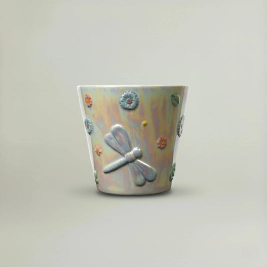 Small Dragonfly Planter in iridescent ceramic finish with pastel floral details, decorative mini planter for succulents and tabletop home décor.