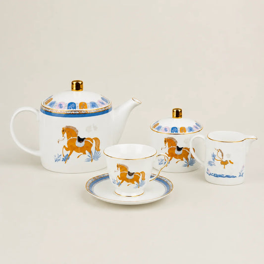 Luxury equestrian porcelain tea set with gold accents and horse motifs.