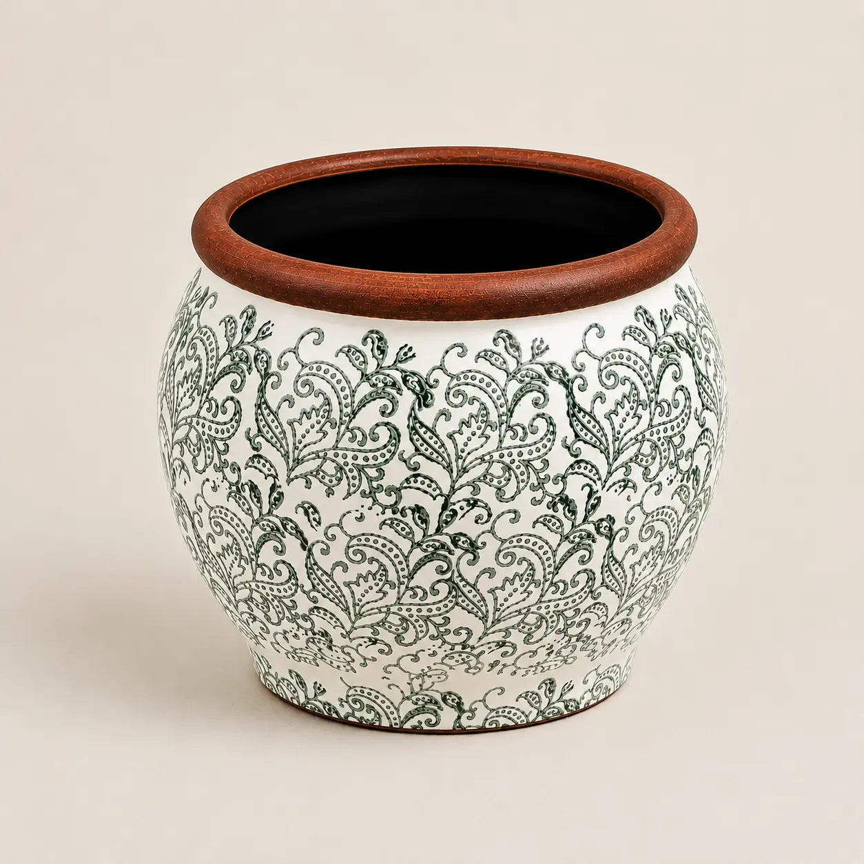 Medium ceramic planter featuring intricate green paisley artwork.