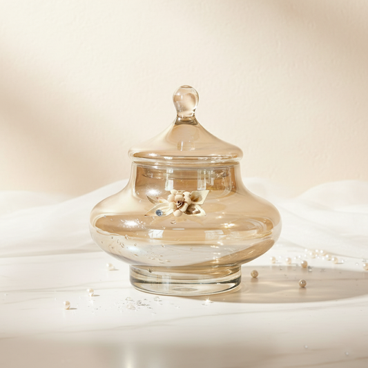 Splendor amber decorative jar by Fleur De Lis styled as luxury home décor, showcasing a lidded glass jar with floral detailing in an elegant setting.