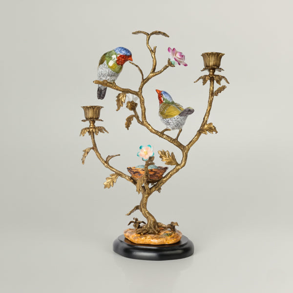 Luxury decorative candle holder featuring sculpted birds on a branching design with antique gold finish, ideal for elegant home décor.