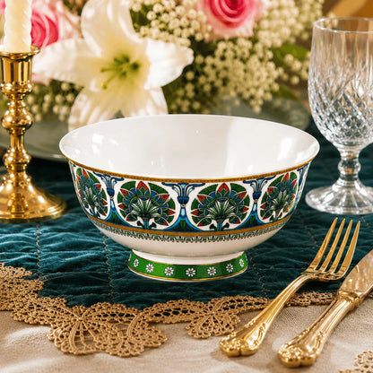 Premium footed ceramic bowl with a green daisy base and rich teal and emerald green floral patterns.