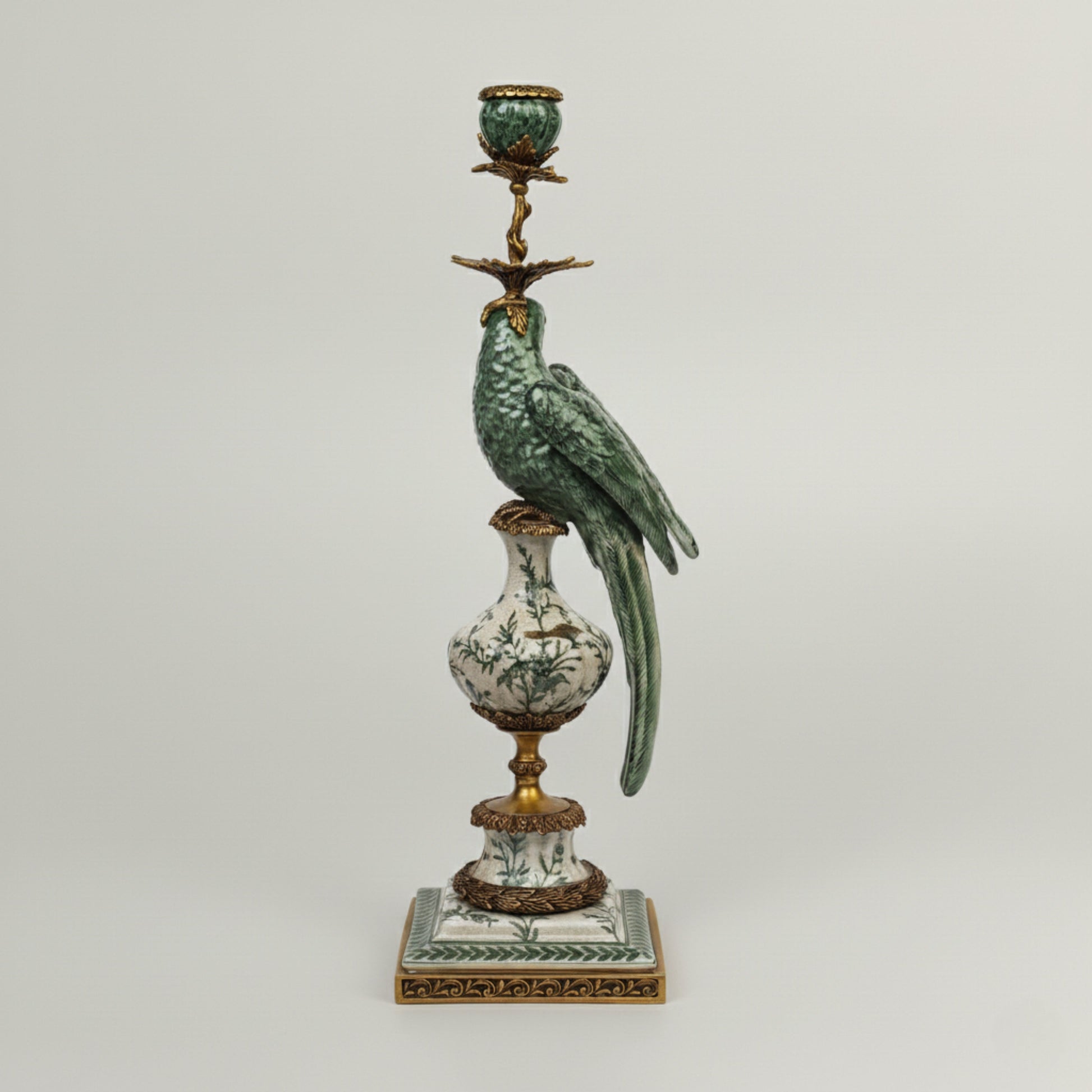 Luxury porcelain parrot candle holder with hand-painted green finish and antique gold detailing, designed for elegant home décor.