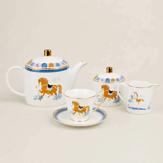 Luxury equestrian porcelain tea set with gold accents and horse motifs.