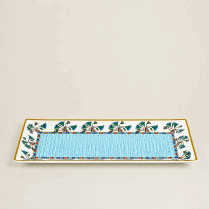 Rectangular ceramic serving platter featuring a turquoise chevron pattern and an elegant botanical border.