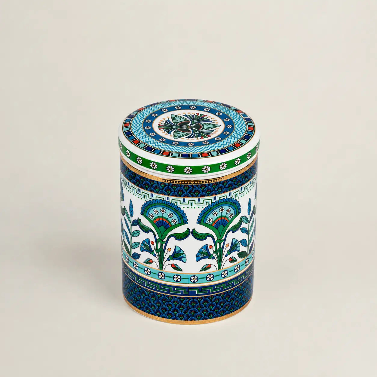 Decorative Mediterranean ceramic canister with intricate blue and green patterns.