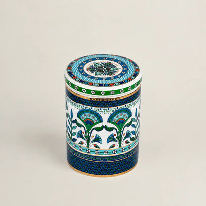 Decorative Mediterranean ceramic canister with intricate blue and green patterns.
