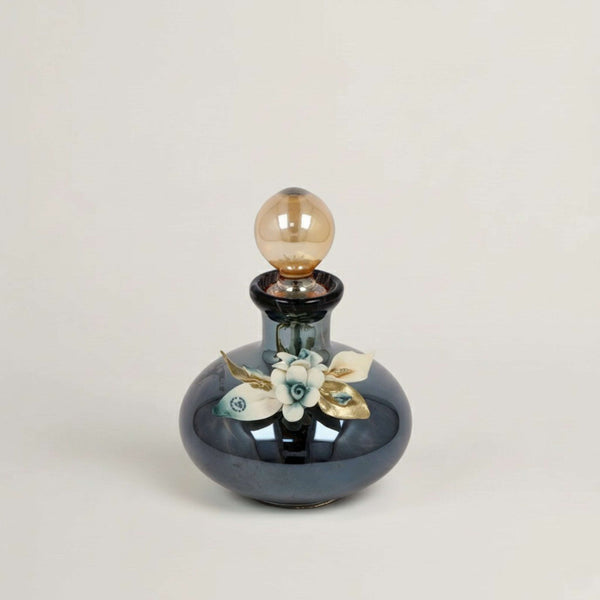 Handcrafted Onyx Murano black crystal perfume bottle with white, blue and gold floral detailing by Fleur De Lis