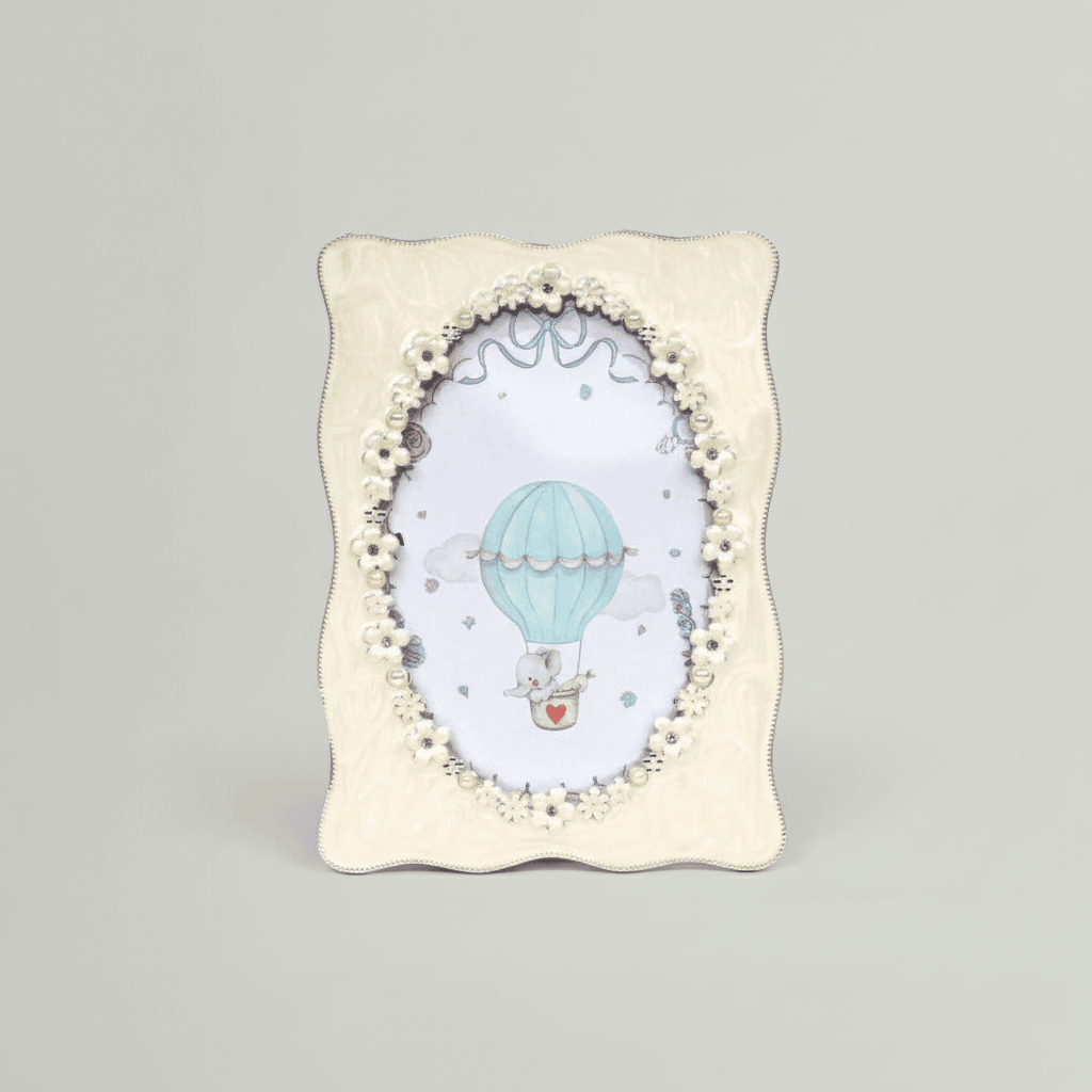 Decorative photo frame with a hot air balloon design on a gray background