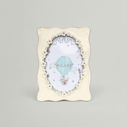 Decorative photo frame with a hot air balloon design on a gray background