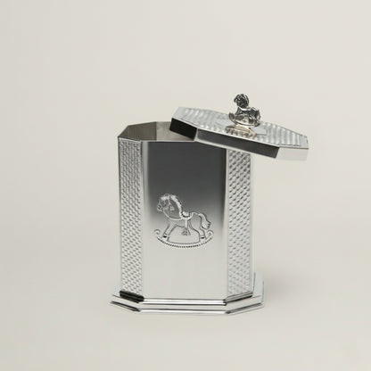 Handcrafted octagonal silver baby keepsake box featuring an engraved rocking horse motif and a miniature horse handle on the lid.