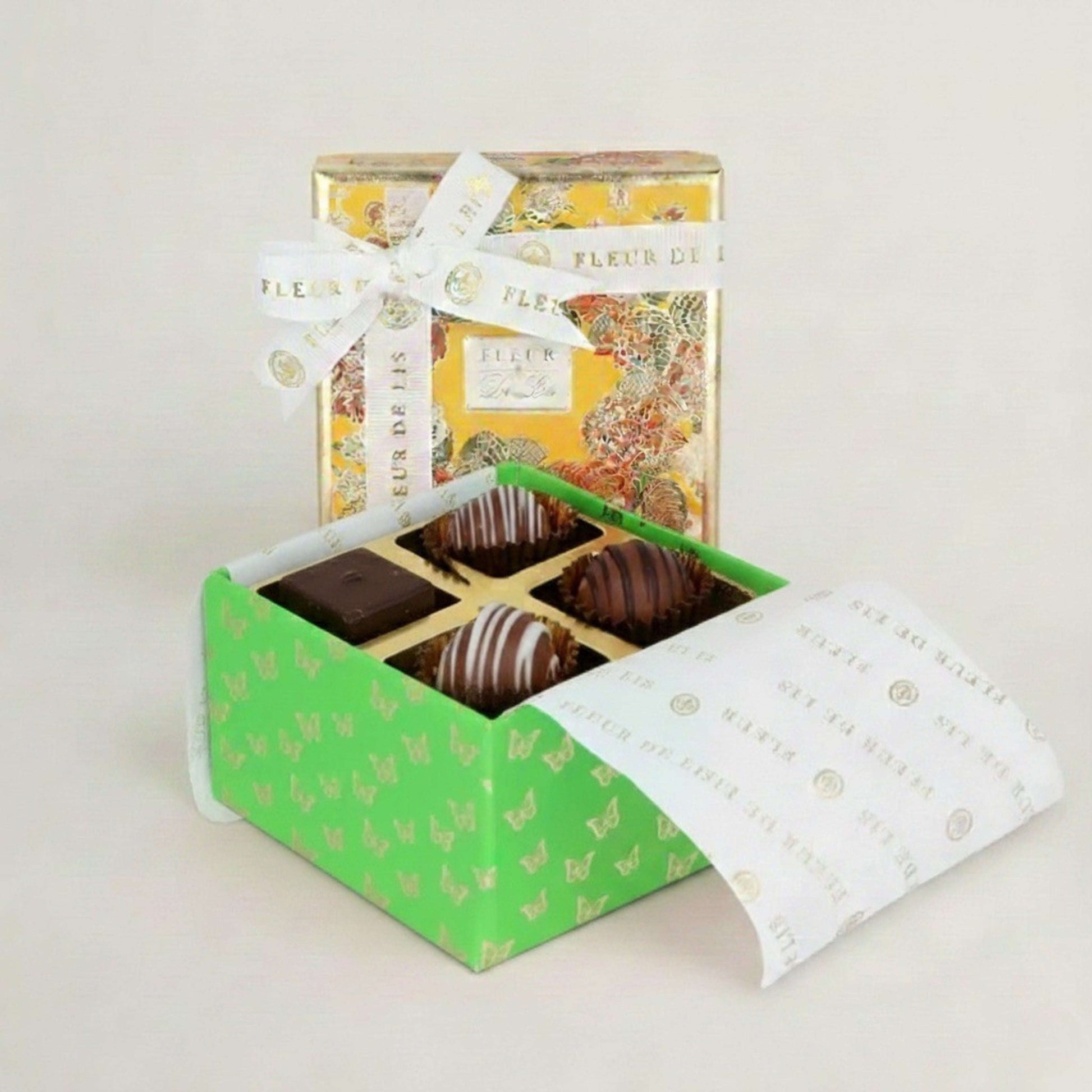 Surprise Box – 4 Assorted Praline Burst Chocolates Fleur de Lis